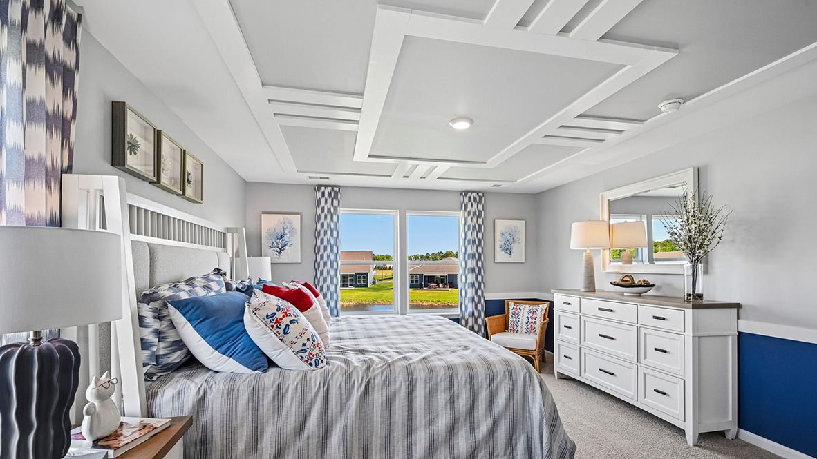 Upstairs, the large owner’s bedroom has a walk-in closet and a modern bathroom.