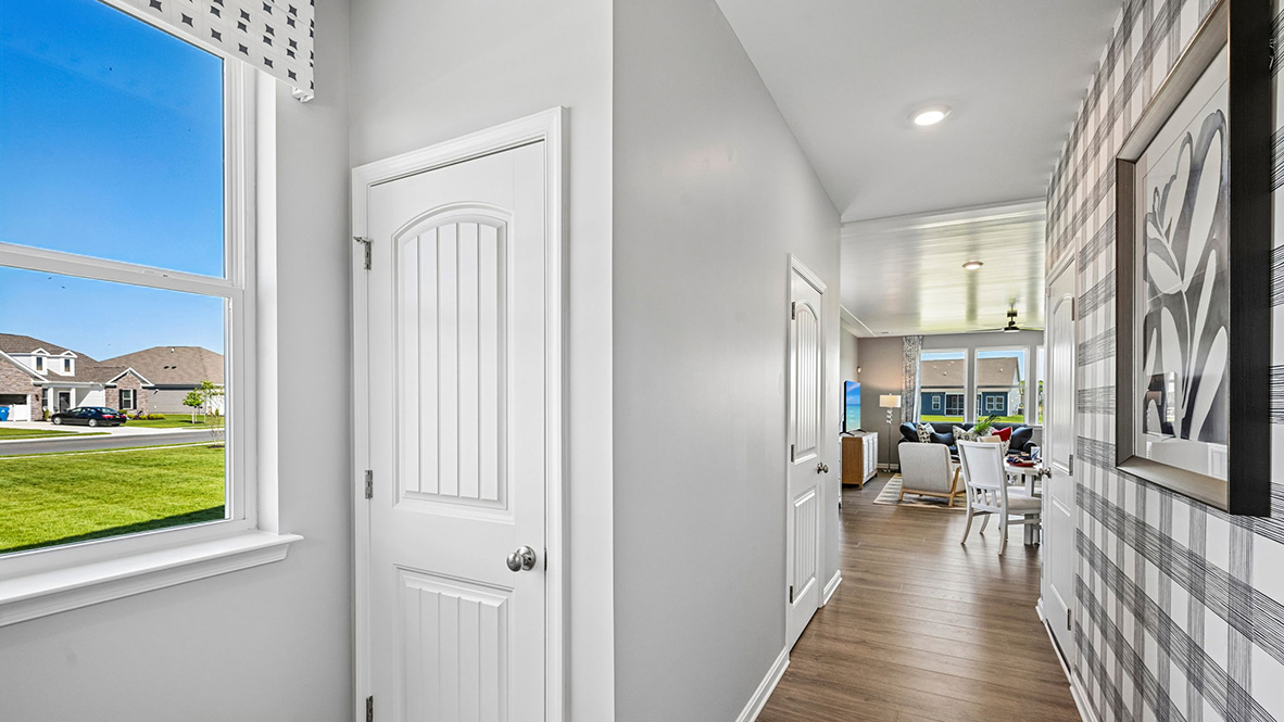 The inviting foyer offers easy access to the upstairs.