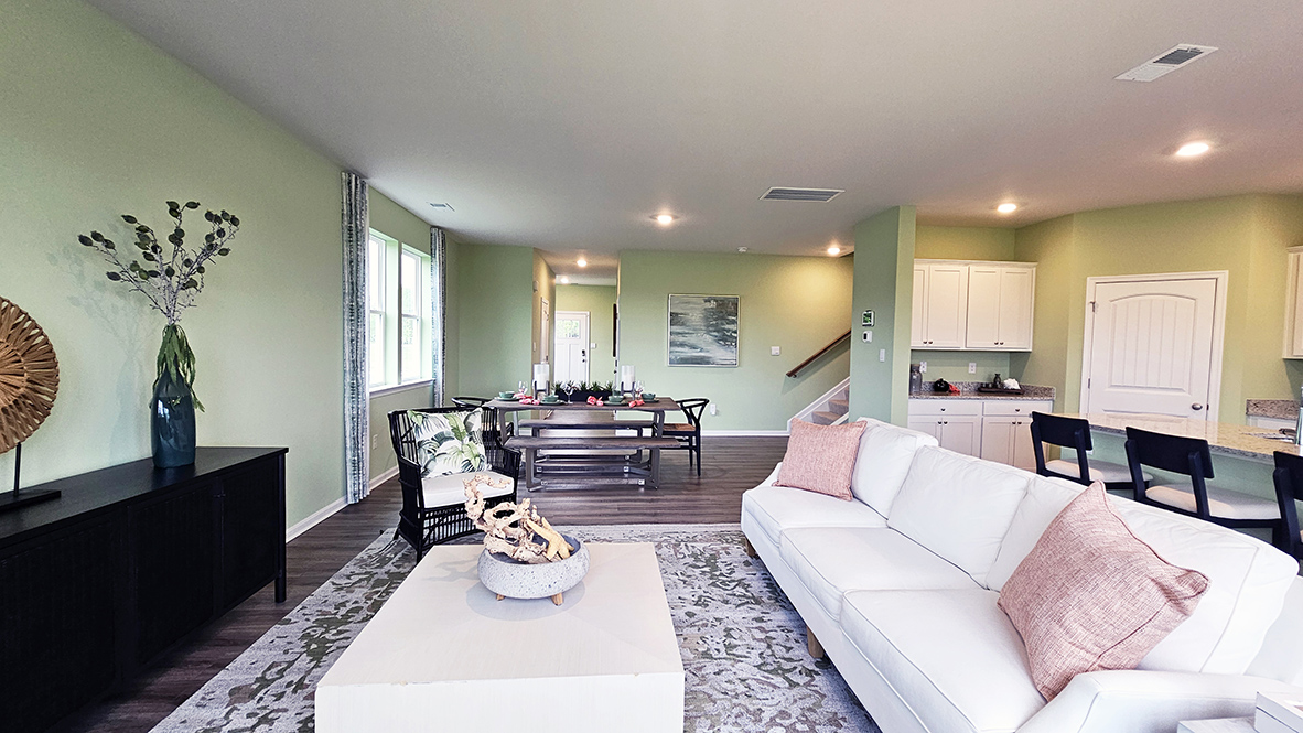 The dining area and expansive great room are all open and allow for family and friends to gather comfortably.