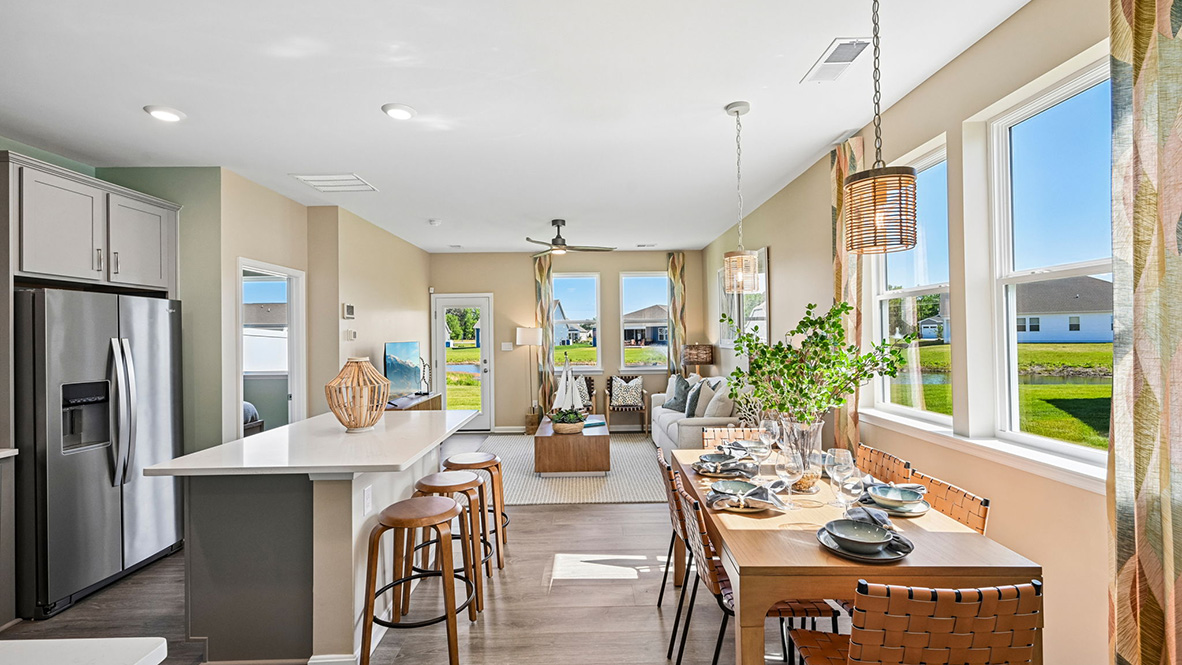 The home’s well-designed eat-in kitchen boasts a center island with room for seating.