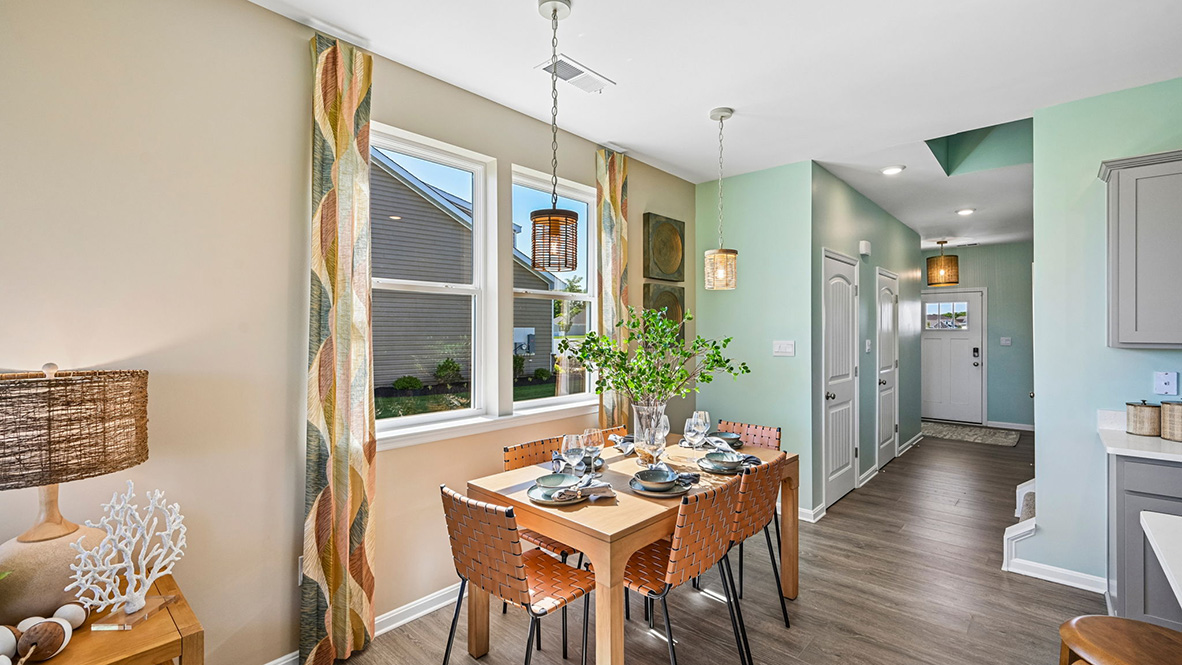 The kitchen is open to the dining area.