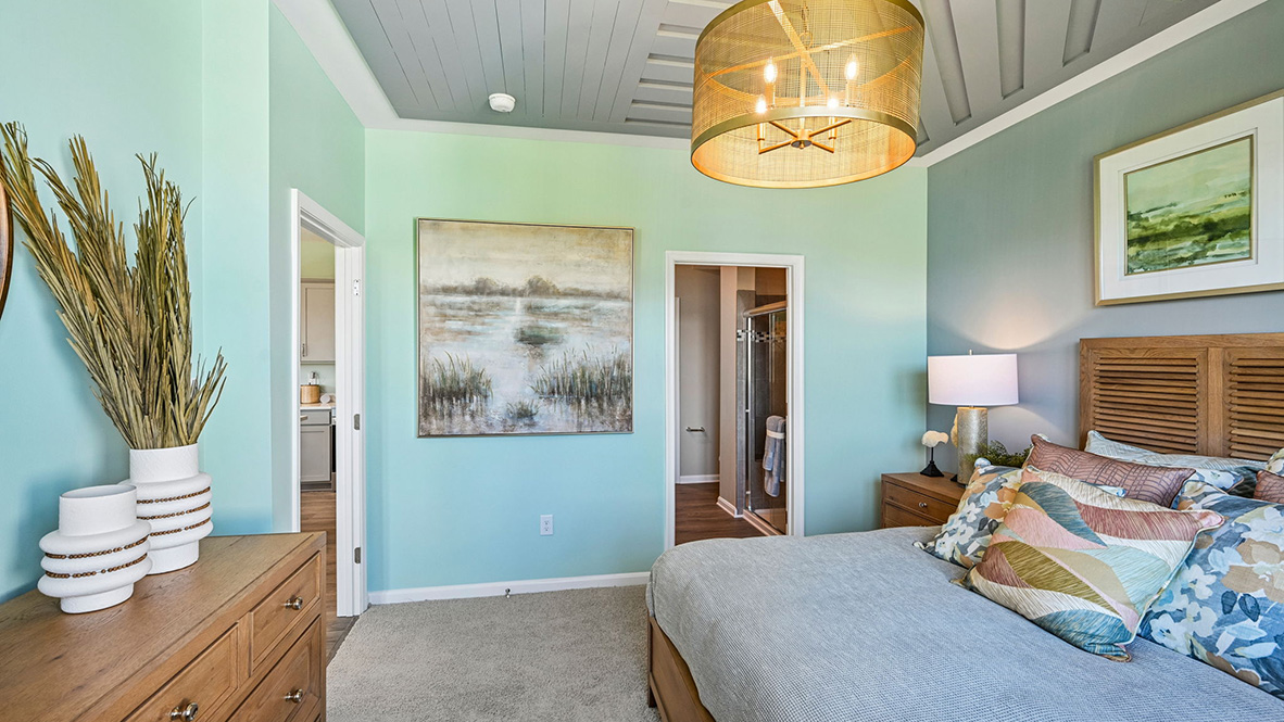 The large first-floor bedroom is a retreat in the back of the home.