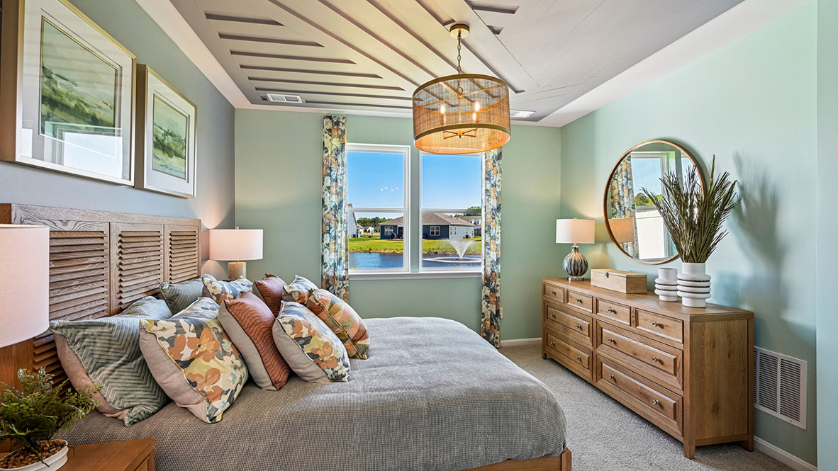 The large first-floor bedroom is a retreat in the back of the home.