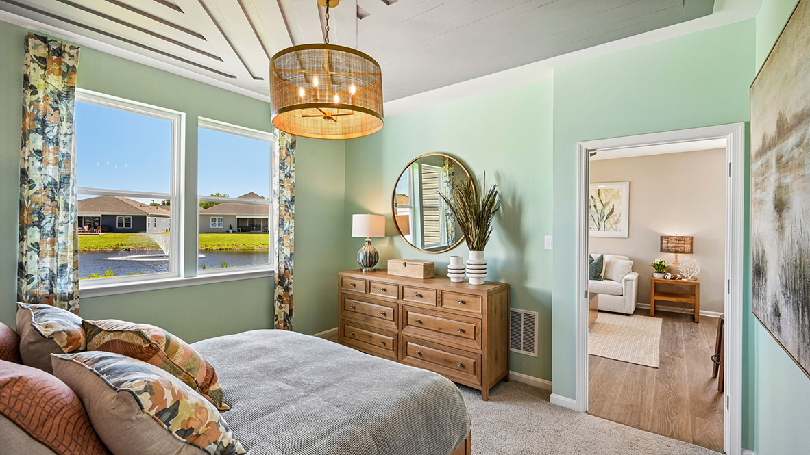 The large first-floor bedroom is a retreat in the back of the home.