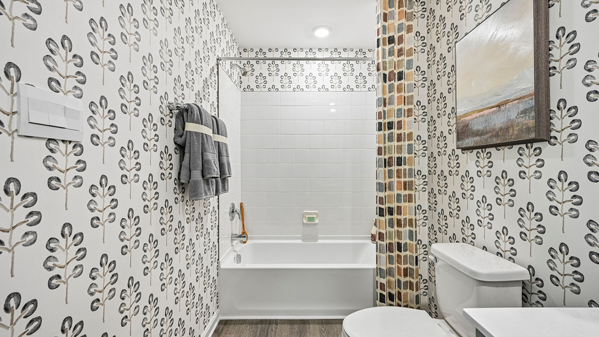 The guest bathroom is a full bath.