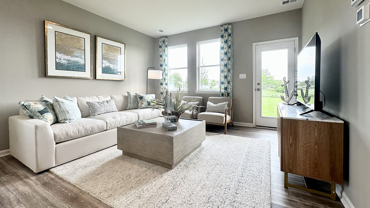 The great room gives access to the backyard.