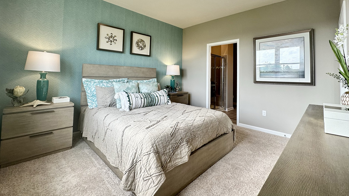 The large first-floor bedroom is a retreat in the back of the home.