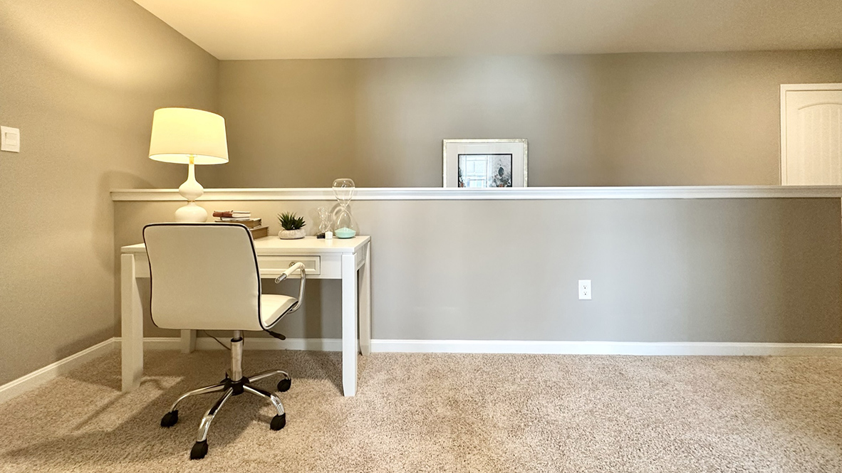 The landing area could be used as a small office.