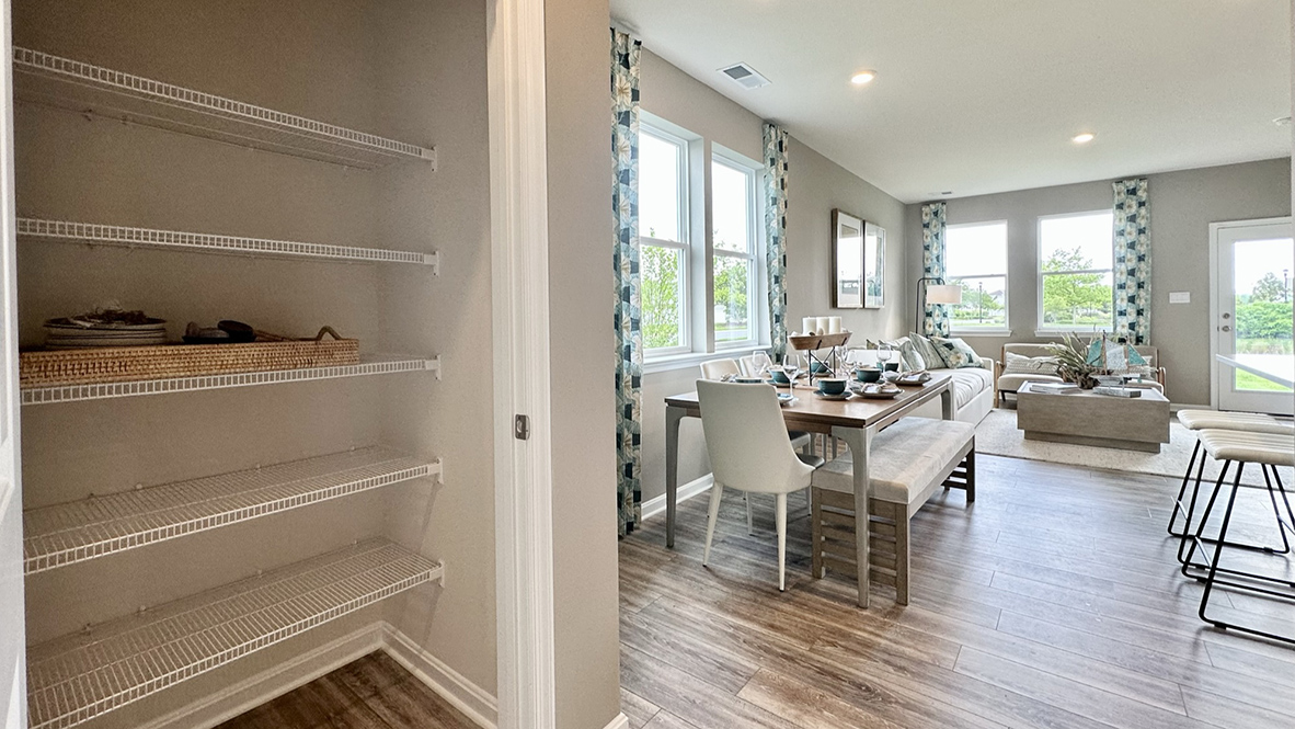 The home’s well-designed eat-in kitchen boasts a pantry closet.