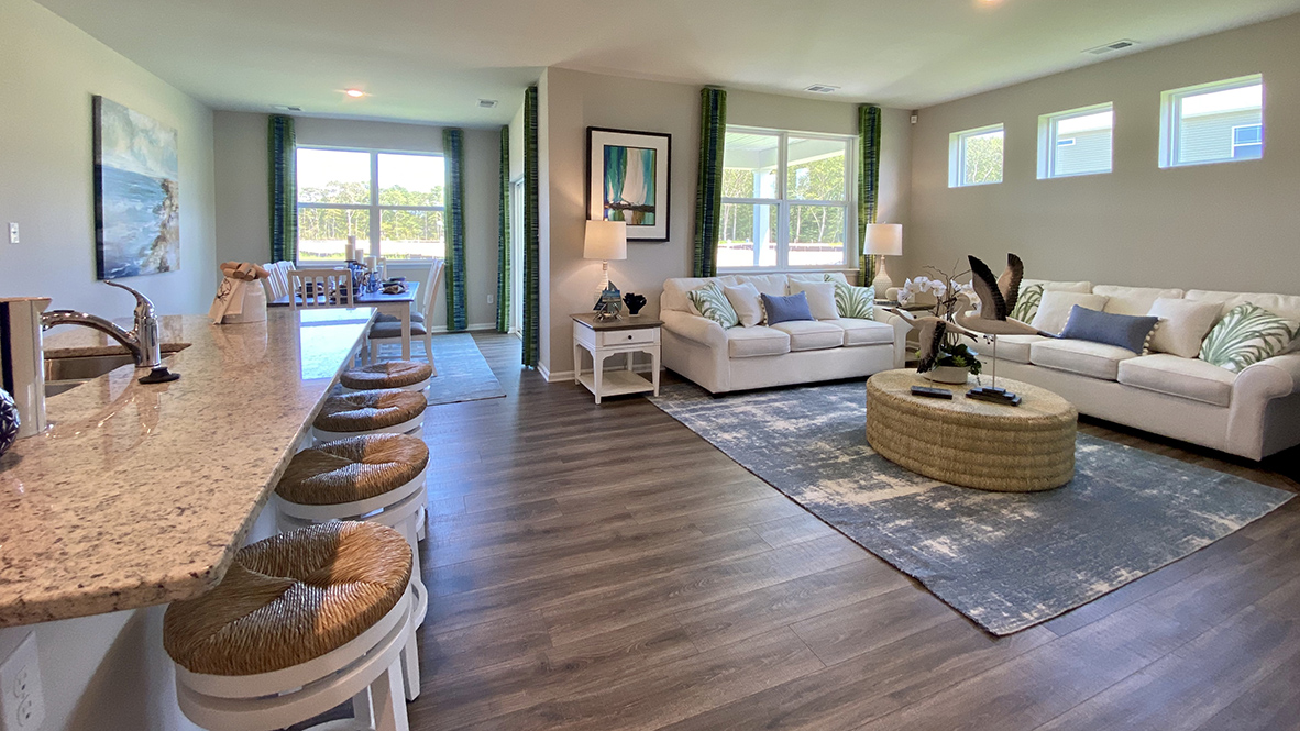 The kitchen is open to the ample living and dining rooms.