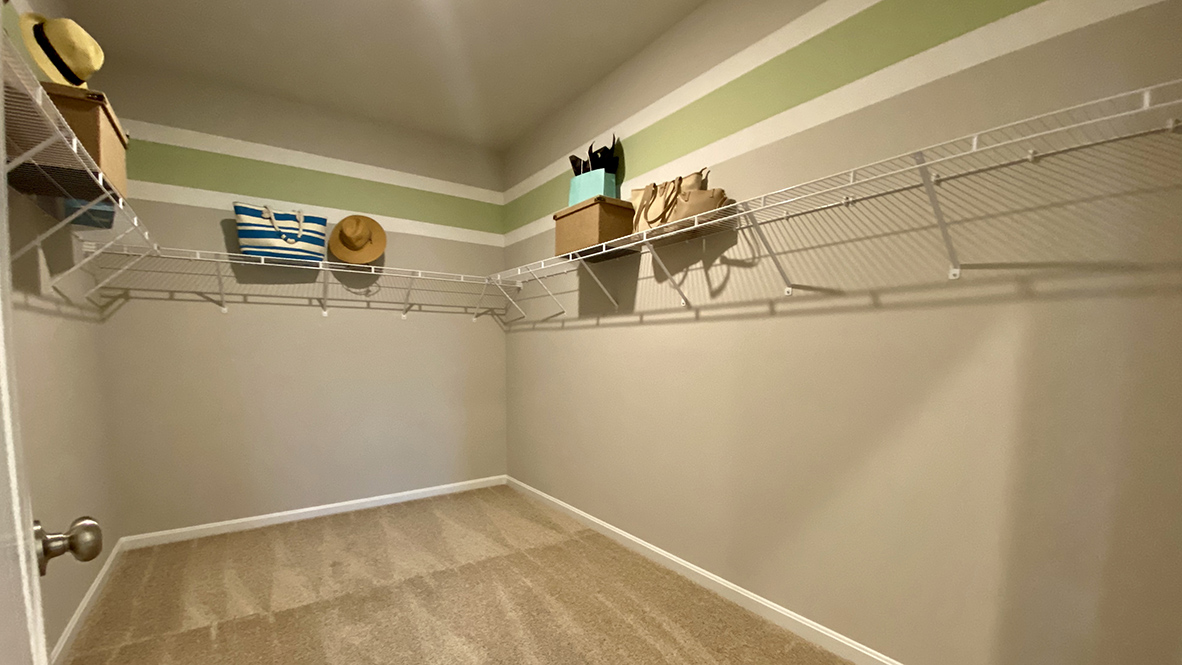 The impressive walk-in closet is a must-see.