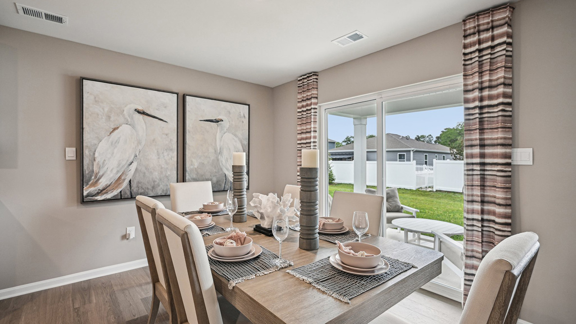 The dining area looks out to the back yard.
