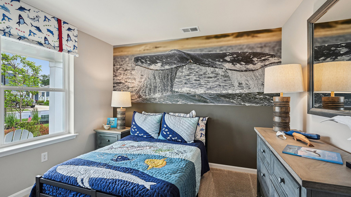 One guest bedroom has a double window.