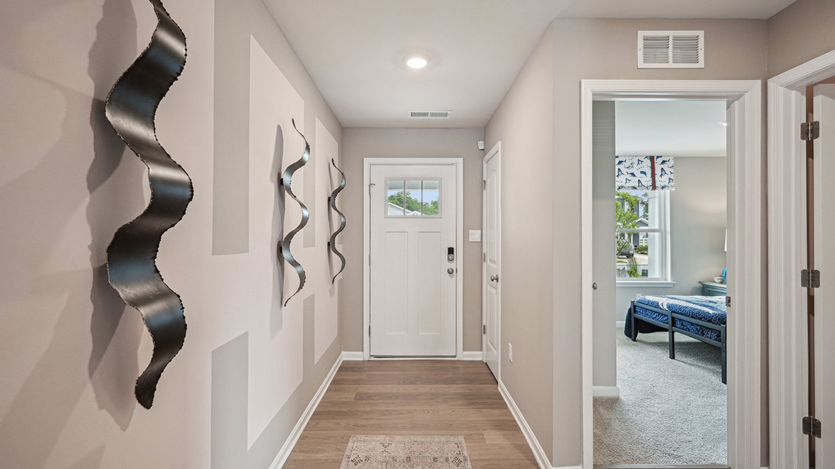 As you enter the home from your porch, there is a long hallway.