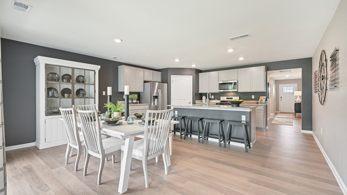 The home has laminate plank flooring throughout the kitchen.