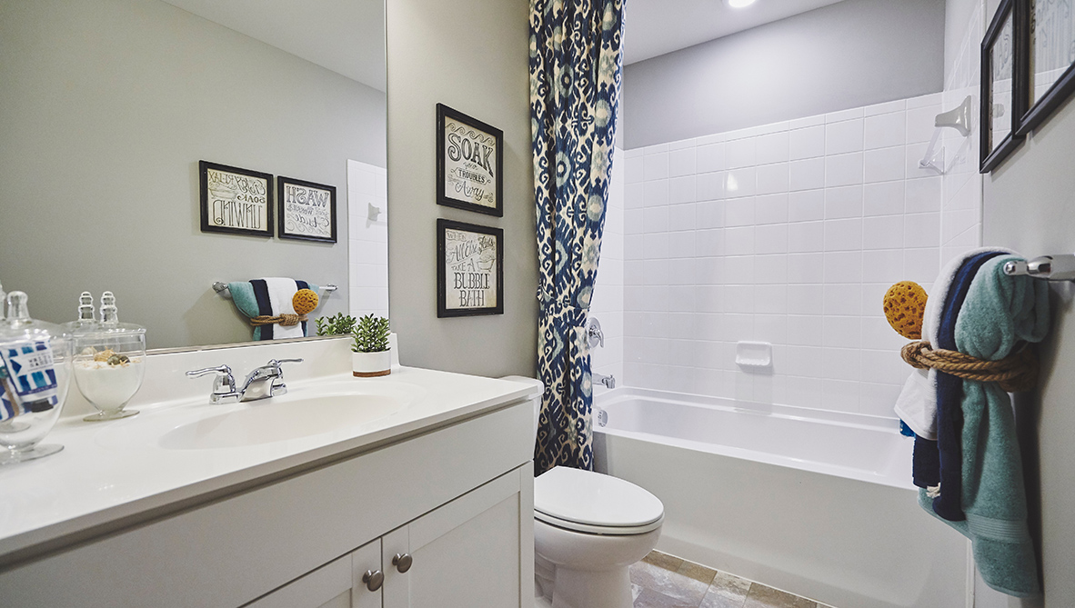 Upstairs, there is an additional bedroom, with plenty of closet space, a full bathroom and a loft.