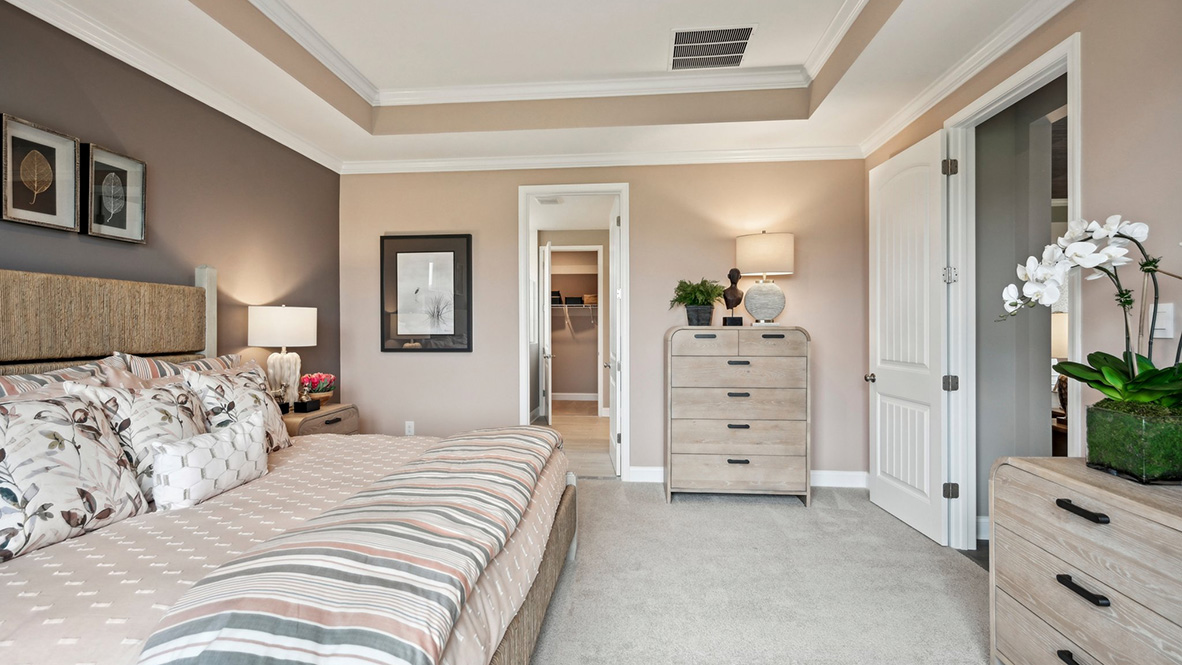 The owner’s suite includes a en suite bathroom and large walk-in closet.