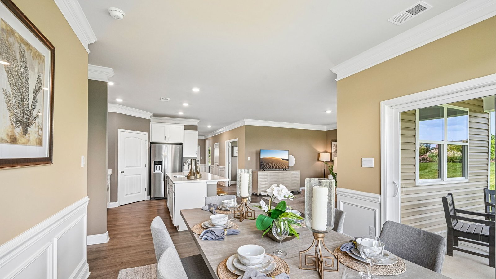 The dining area leads to the rear-covered patio.
