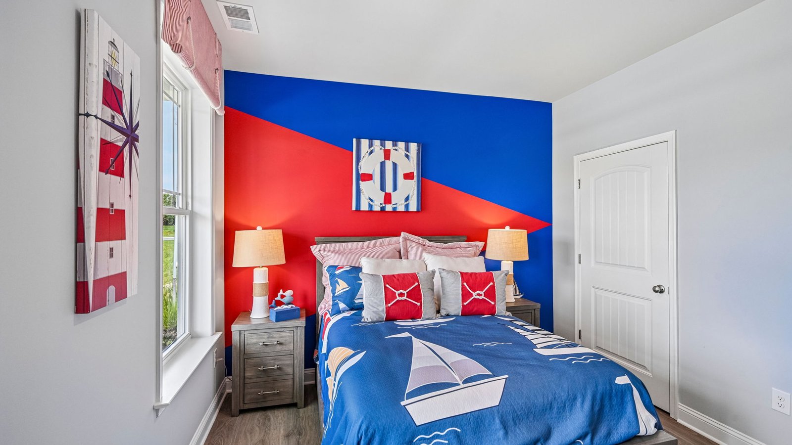 The spacious guest bedroom has a closet.
