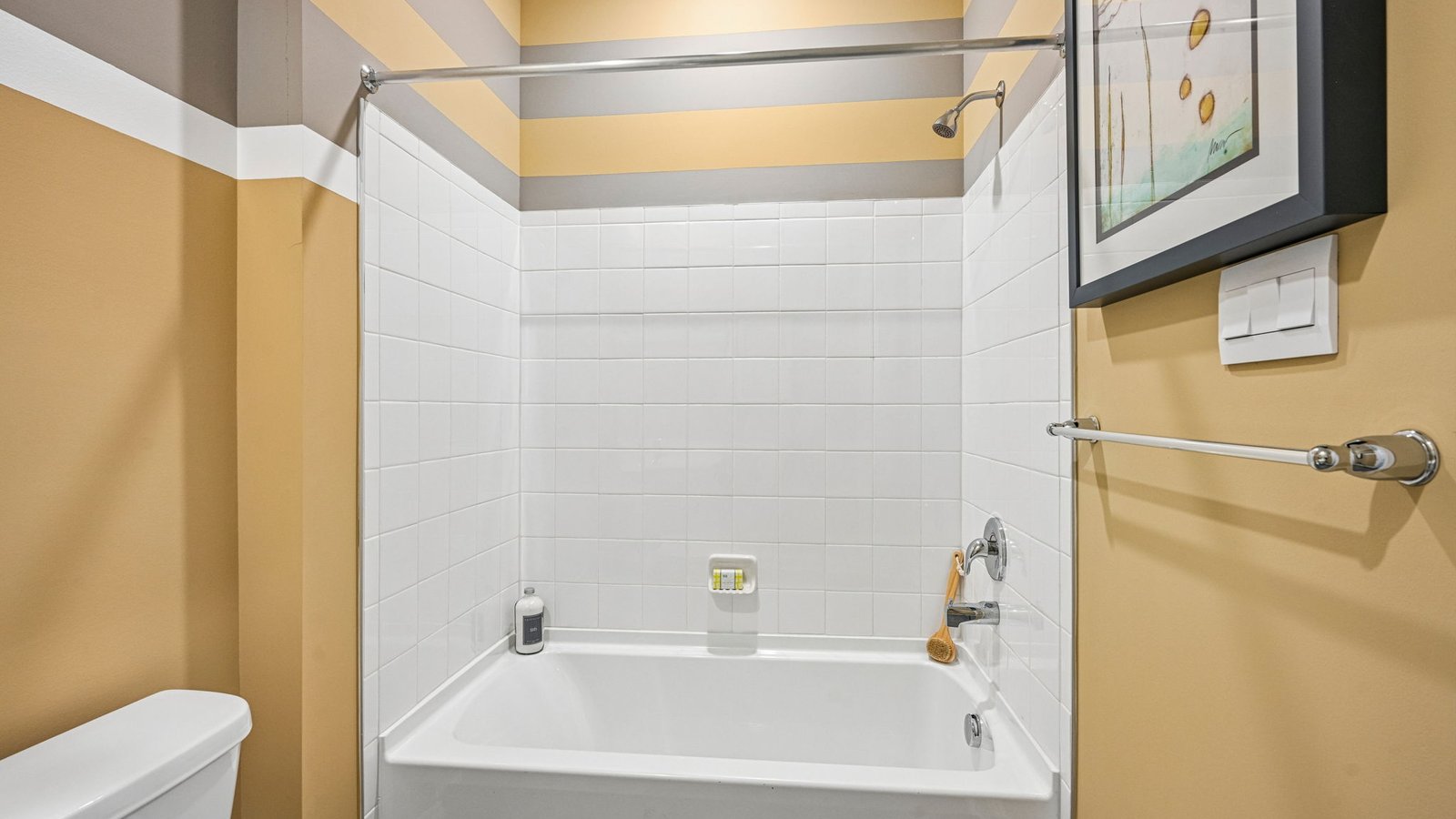 The guest bathroom is across the hall from guest bedroom.