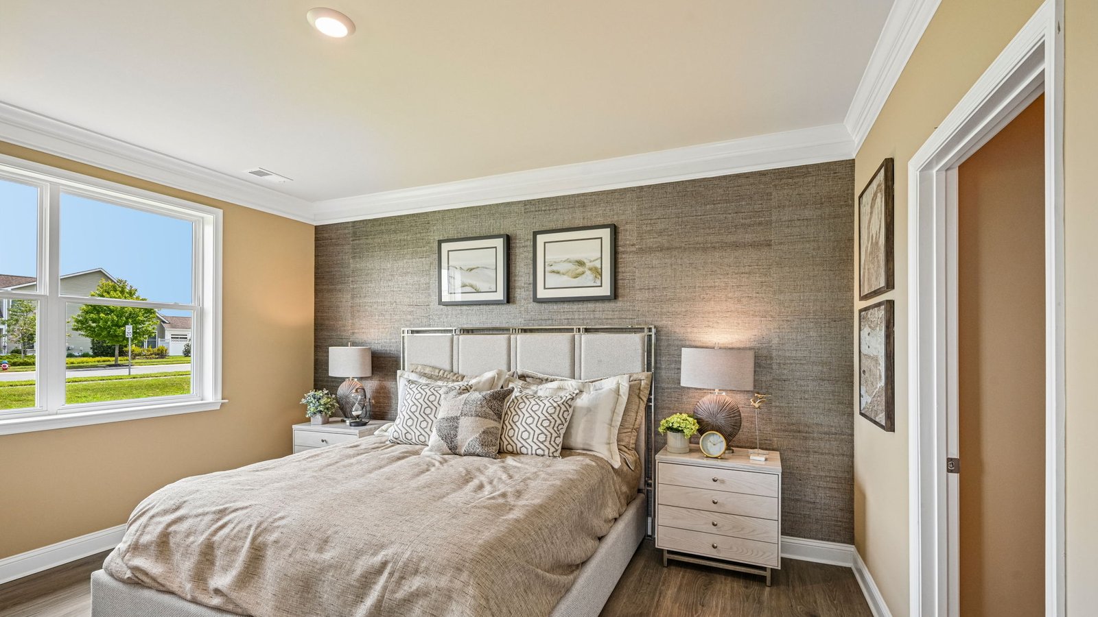 The large primary bedroom is a retreat in the back of the home.