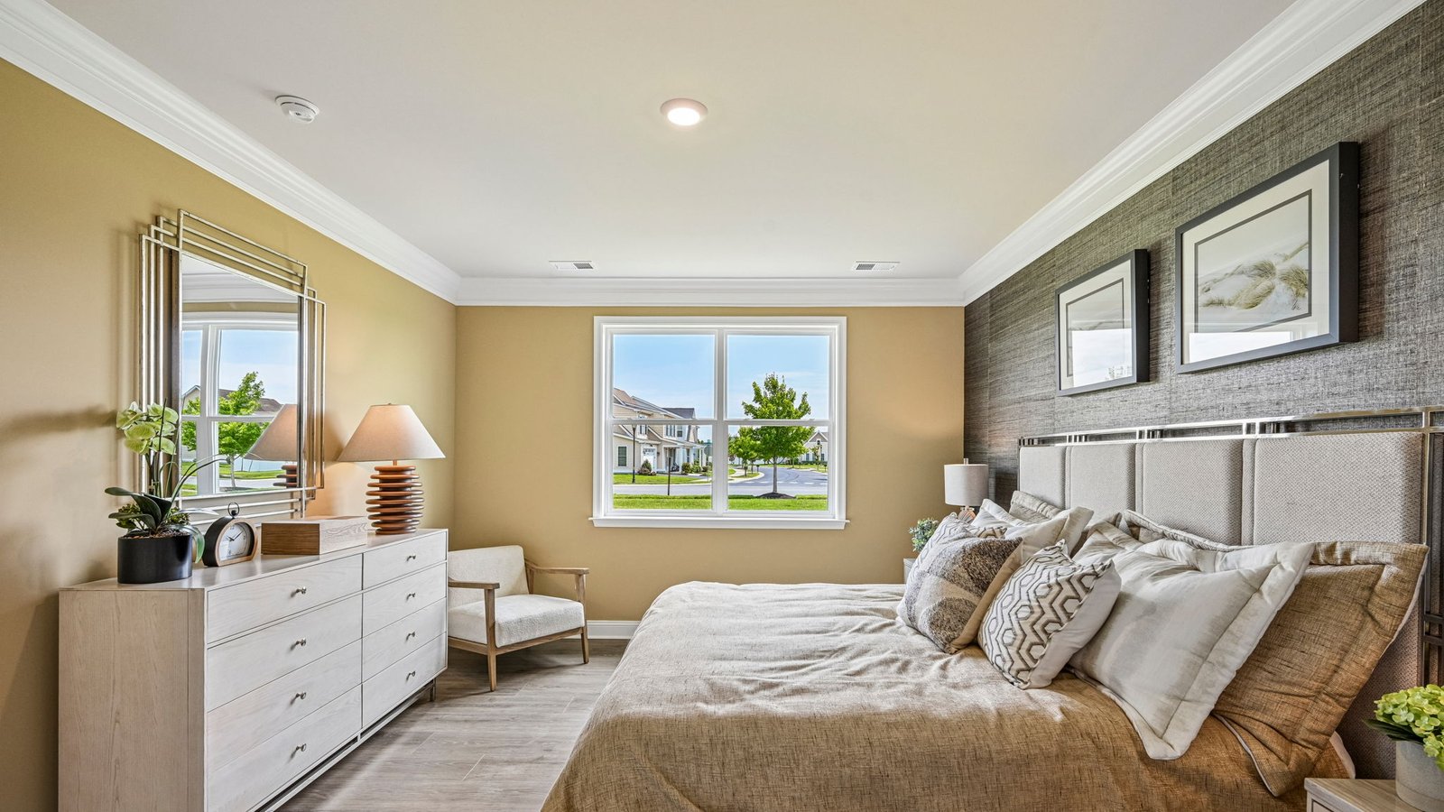 The large primary bedroom is a retreat in the back of the home.
