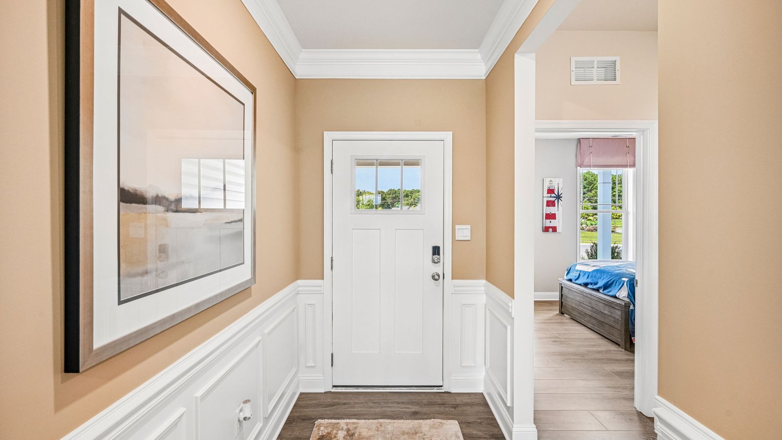 A welcoming foyer greets you as you enter the home.