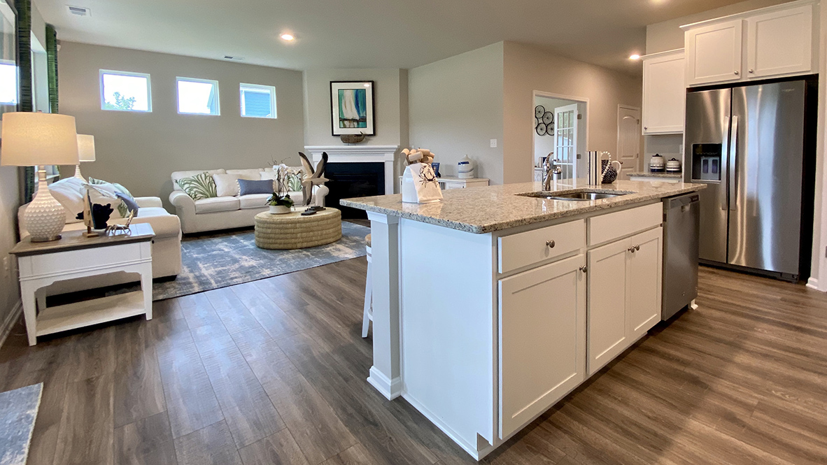 The well-designed kitchen features soft-close cabinets.