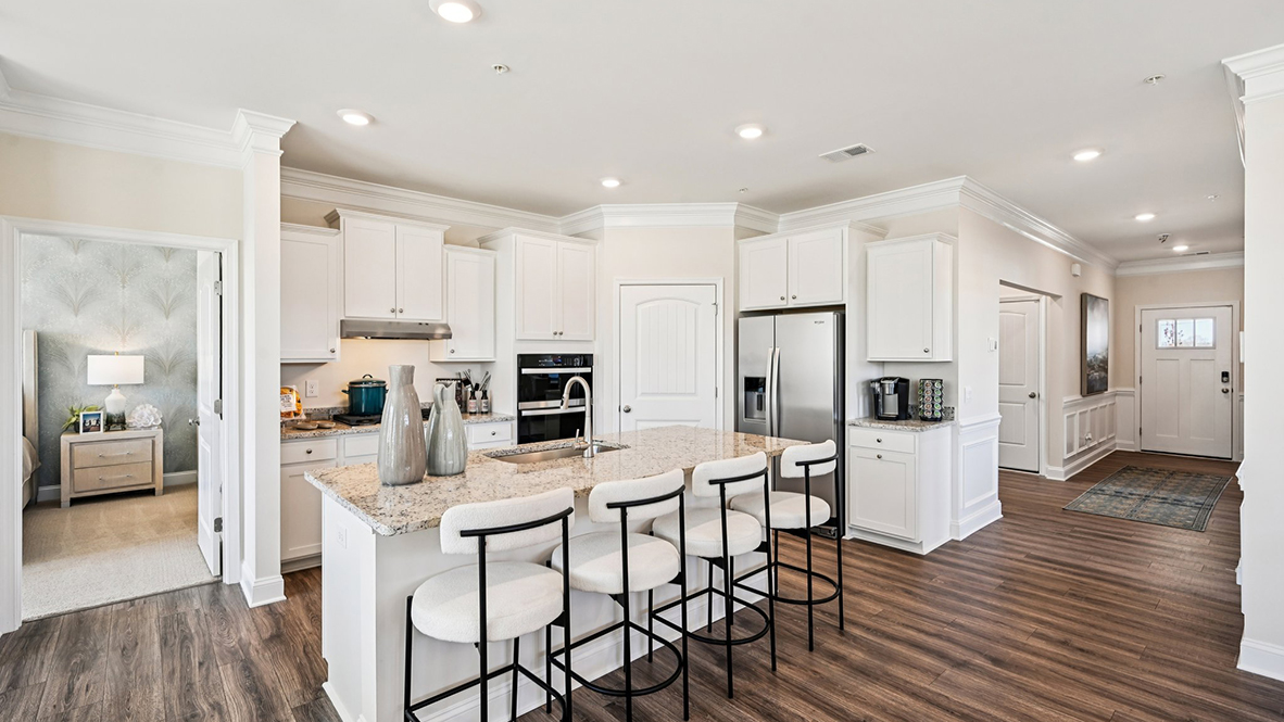The well-designed kitchen features soft-close cabinets.
