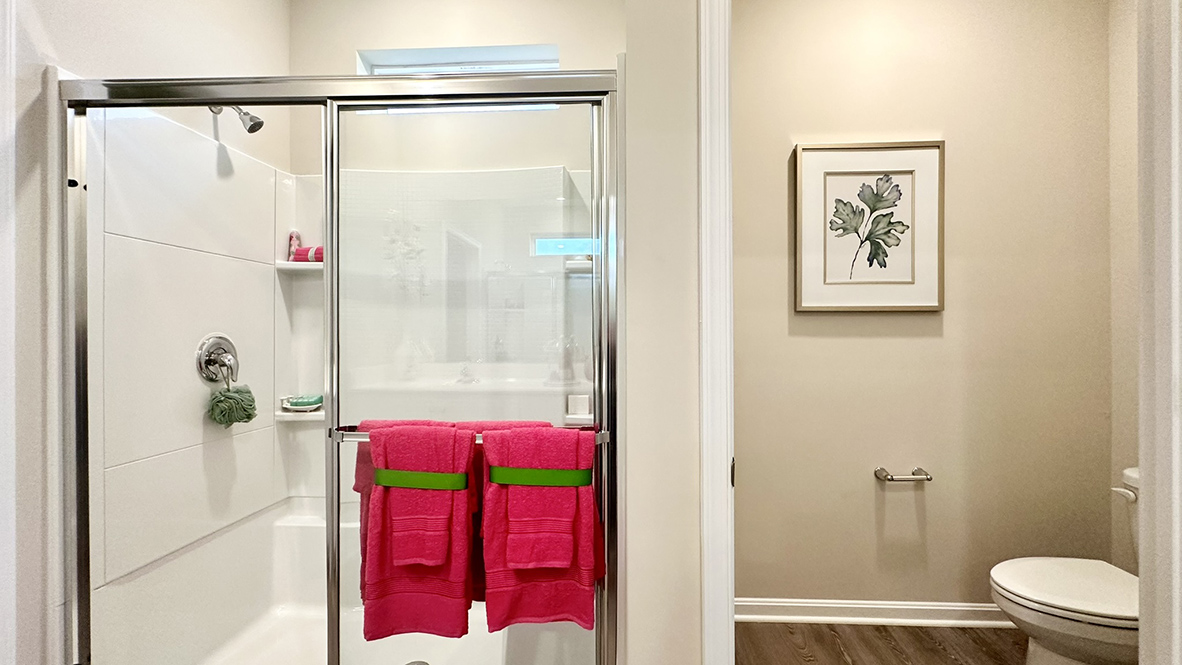 The large primary bedroom has a private bathroom.