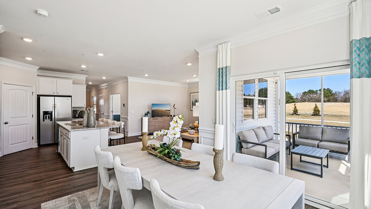 The kitchen is open to the ample living and dining rooms.