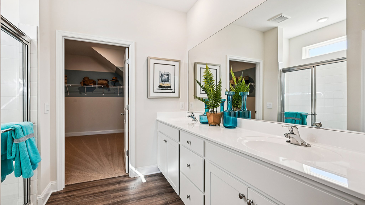 The primary bathroom has a substantial double bowl vanity.