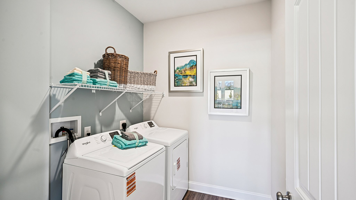 The laundry room is located off the two-car garage.