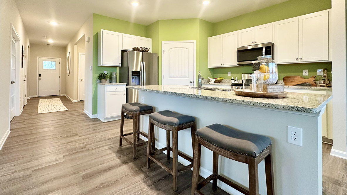 The well-designed kitchen features soft-close cabinets.