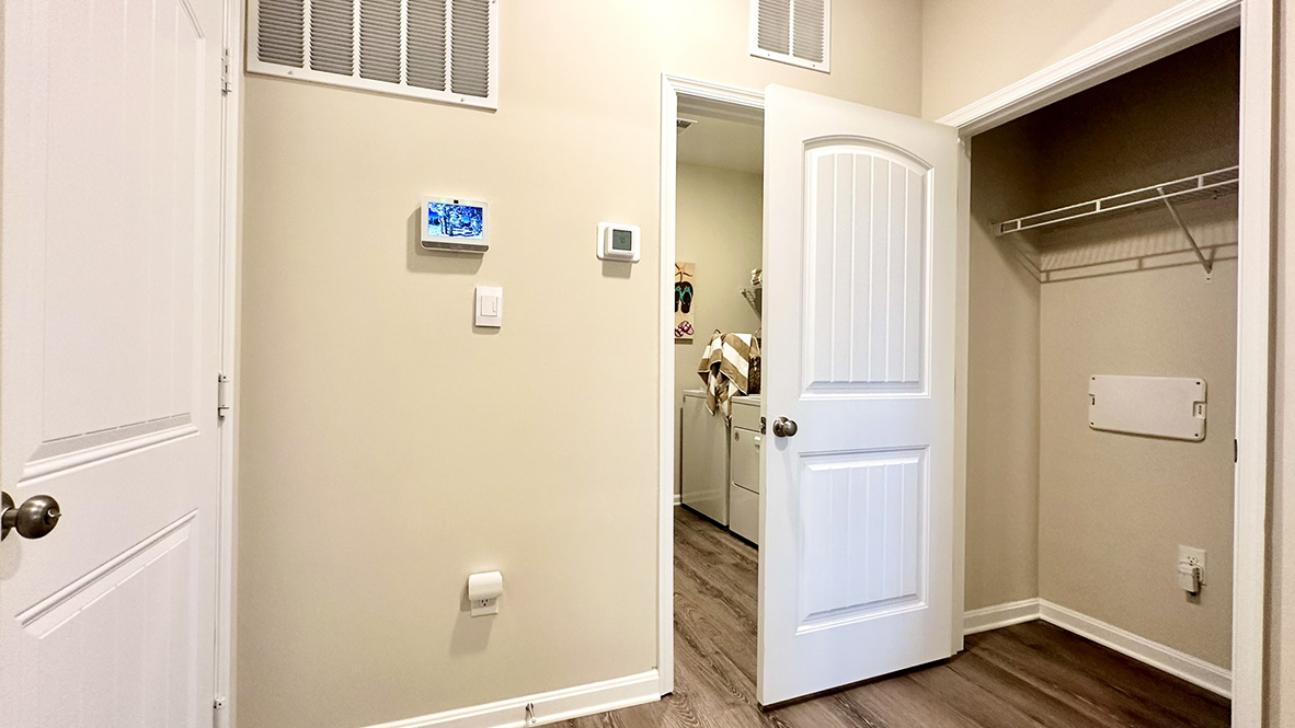 The laundry room is located off the two-car garage.