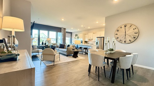 The open floorplan features a well-designed kitchen.