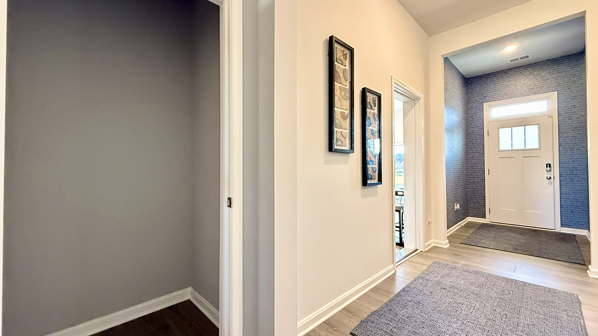 The welcoming foyer has two coat closets.