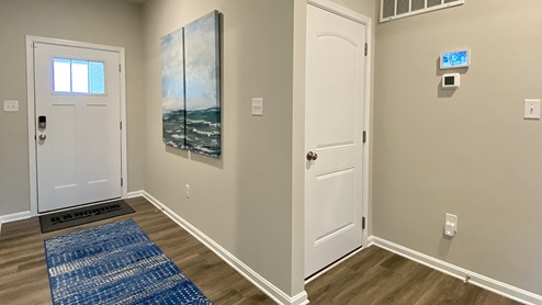 A welcoming foyer greets you as you enter the home.