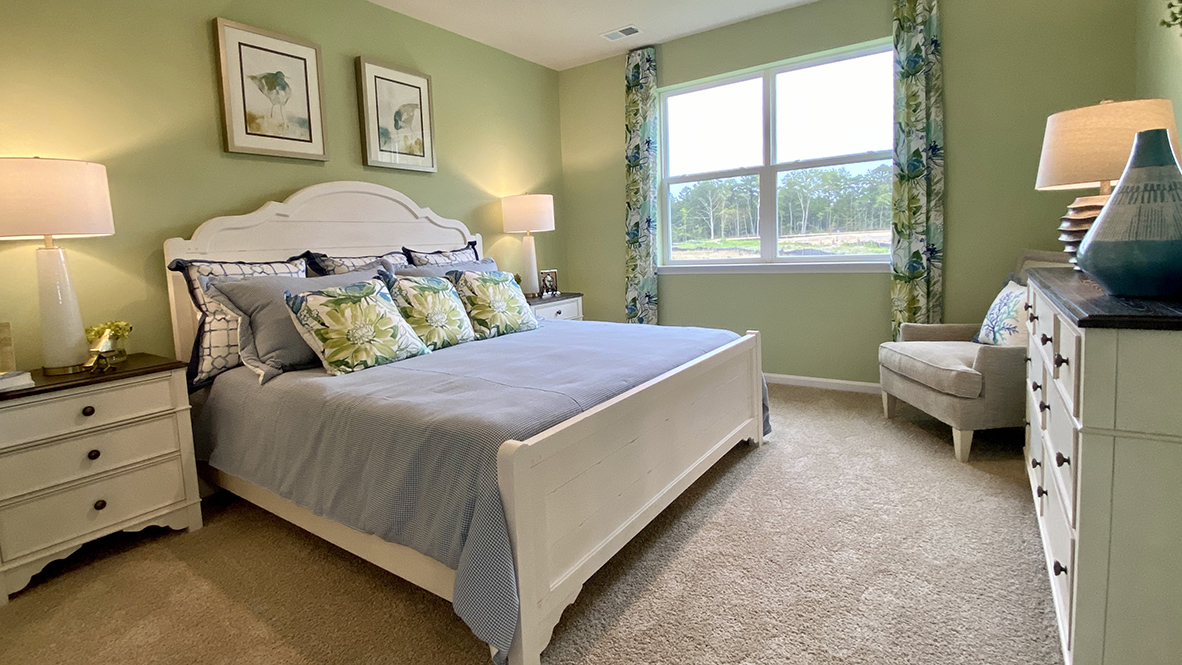 The large primary bedroom has a private bathroom.