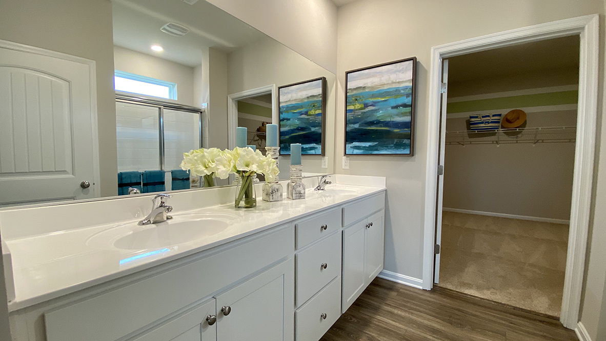 The primary bathroom has a substantial double bowl vanity.