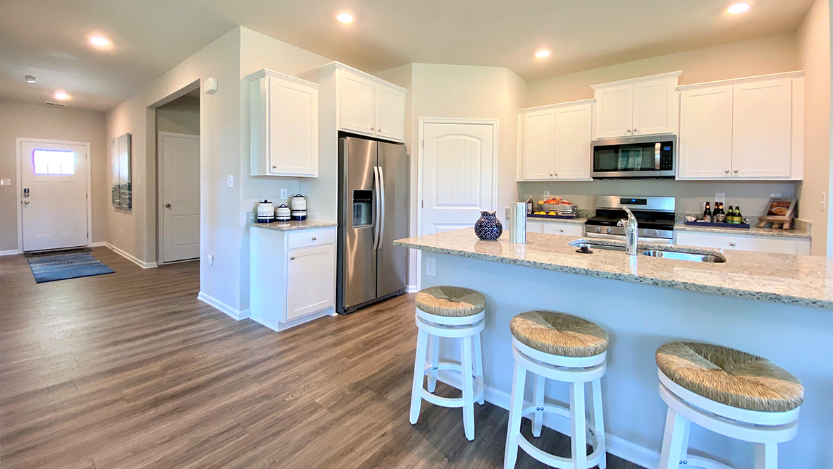 The kitchen has an oversized island with room for seating.