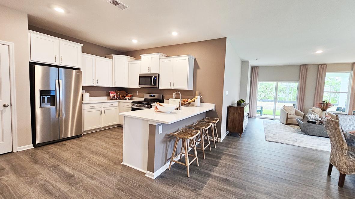 The dining area flows nicely into the functional kitchen.