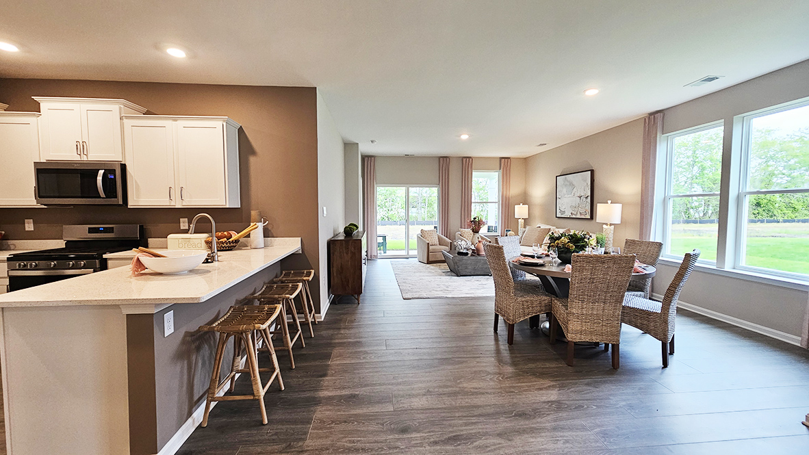 The dining area flows nicely into the functional kitchen.