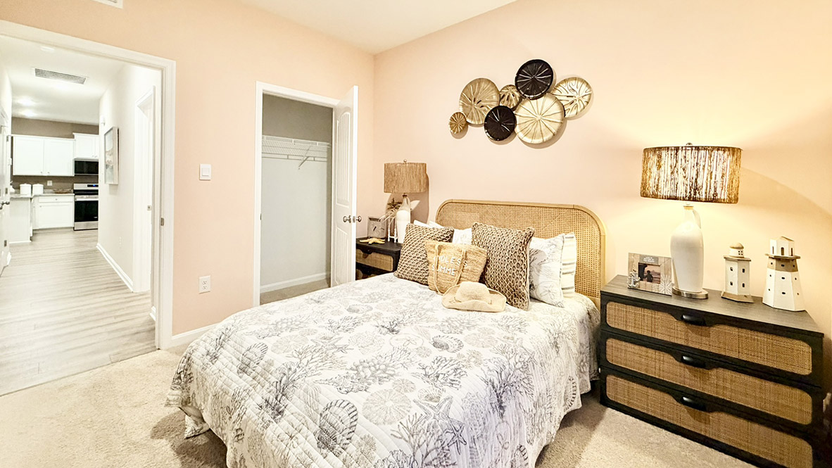 Continuing down the hall is another guest bedroom.