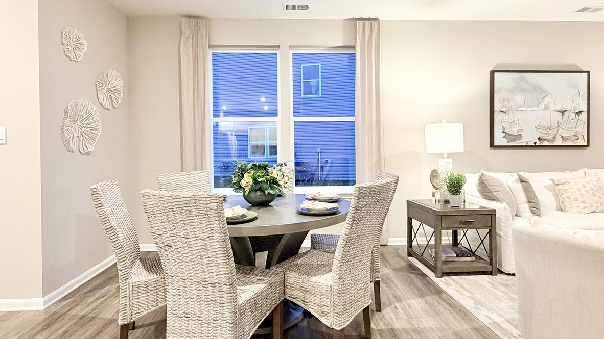 The dining area flows nicely into the functional kitchen.