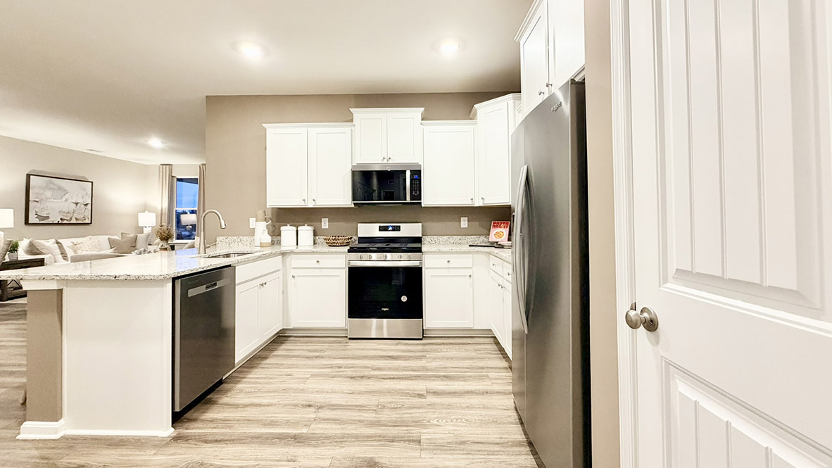 The functional kitchen has well-appointed cabinetry.
