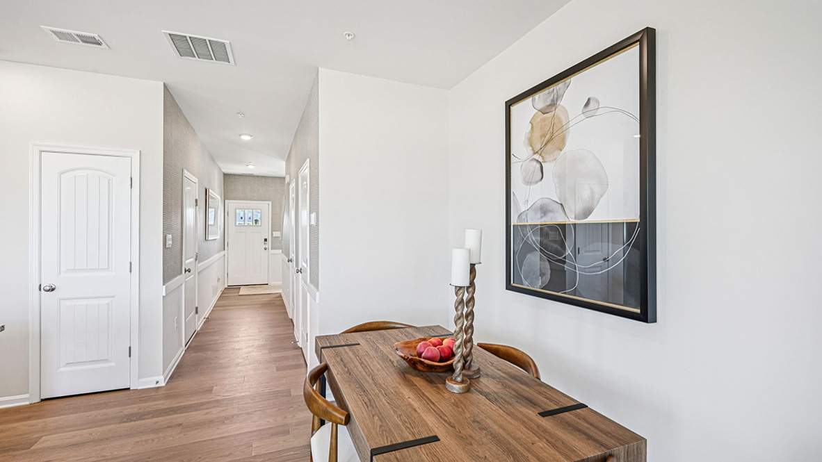 The kitchen is open to the ample dining area.