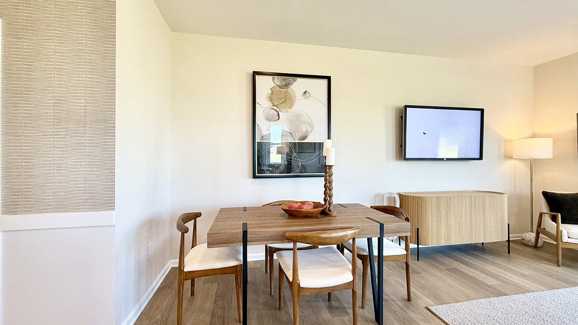 The kitchen is open to the ample dining area.