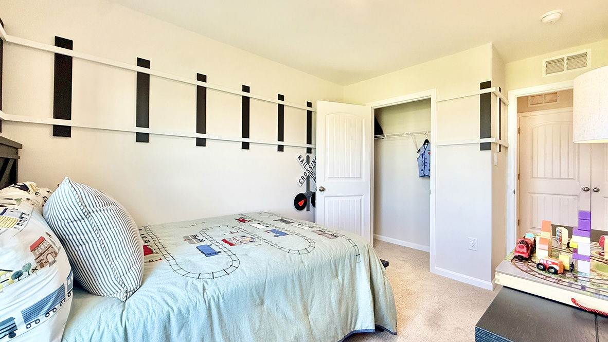 Additionally, there are two sizeable guest bedrooms, each with plenty of closet space.