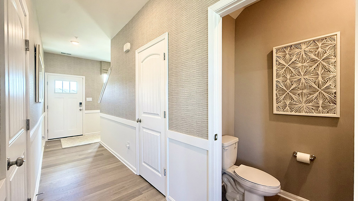 As you enter from the front porch, the inviting foyer leads you to the conveniently located power room.